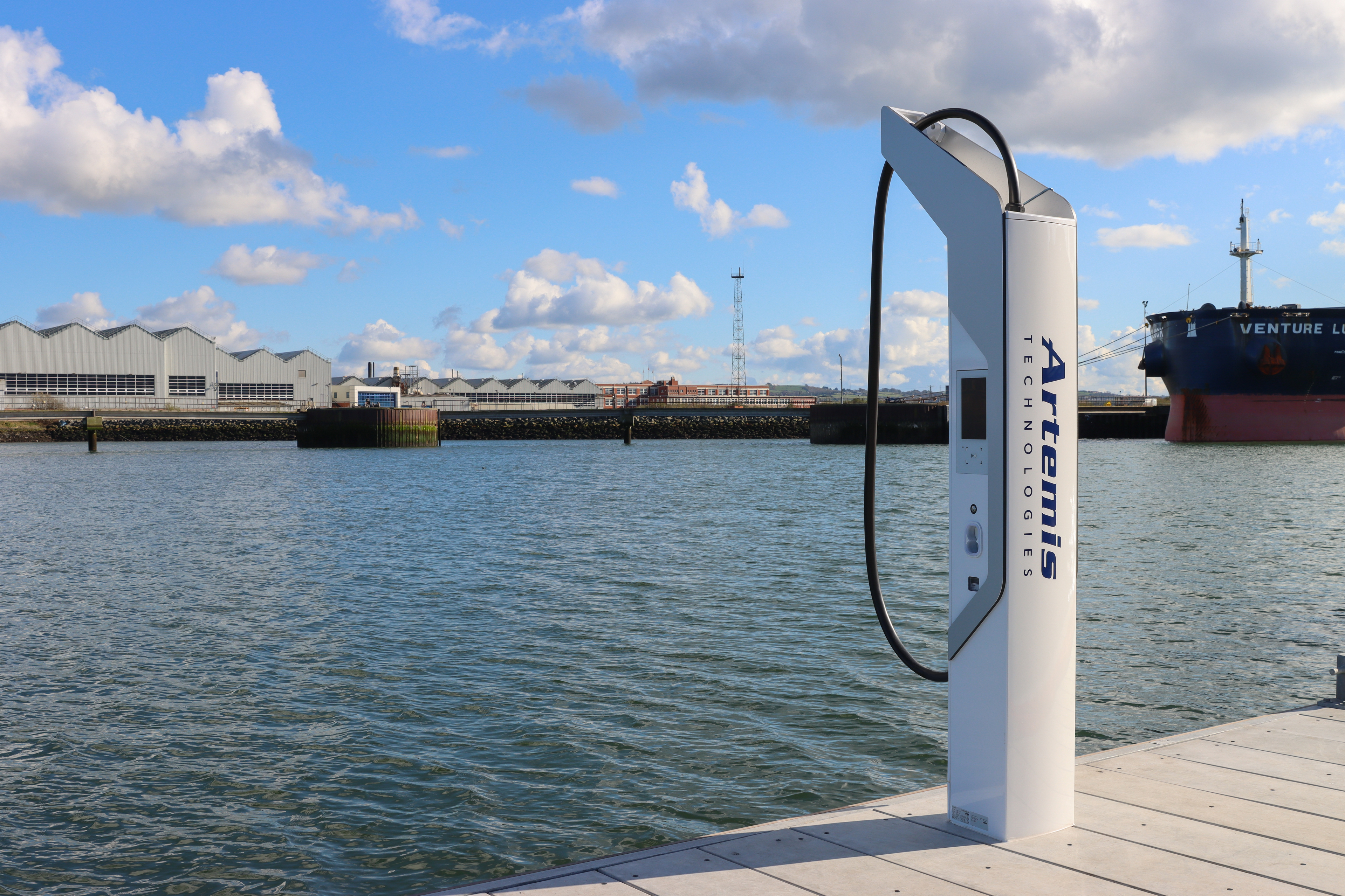 Shore side charger with Artemis Technologies logo on a pontoon in Belfast Harbour