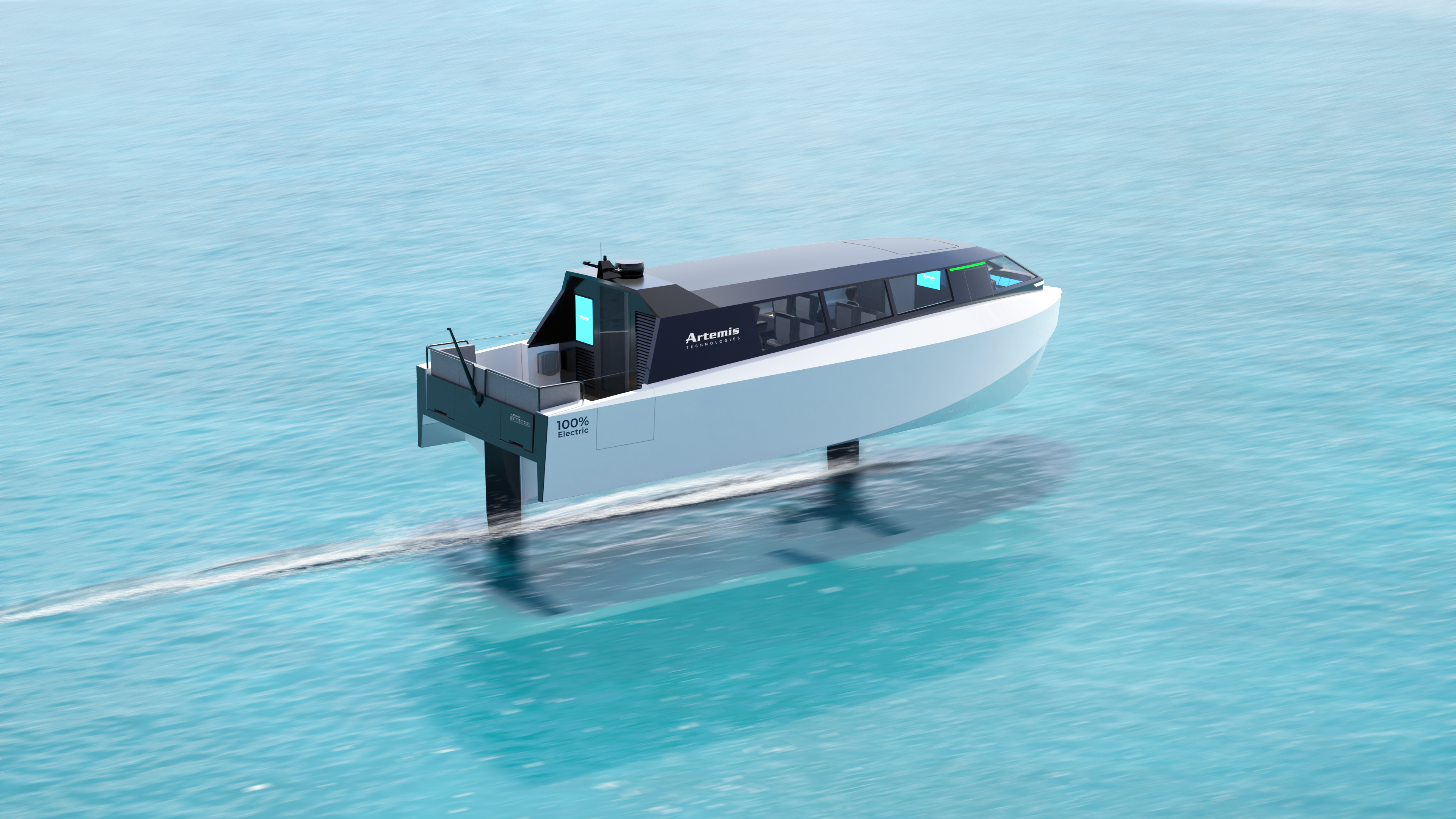 A luxury water taxi foiling in clear blue water