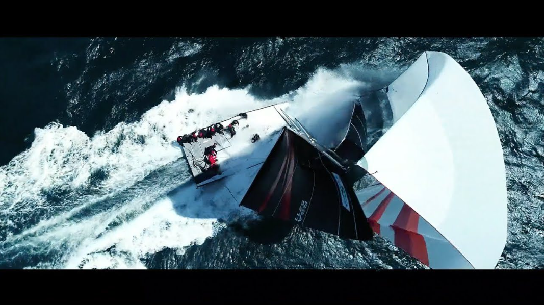 sailing boat on water from ariel view