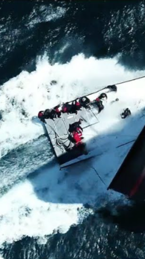sailing boat on water from ariel view