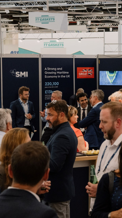 Image of crowd at exhibition and stand