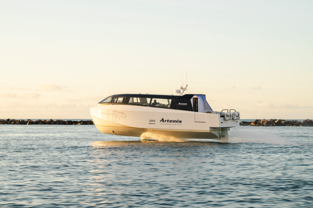 White hydrofoil boat with sunrise