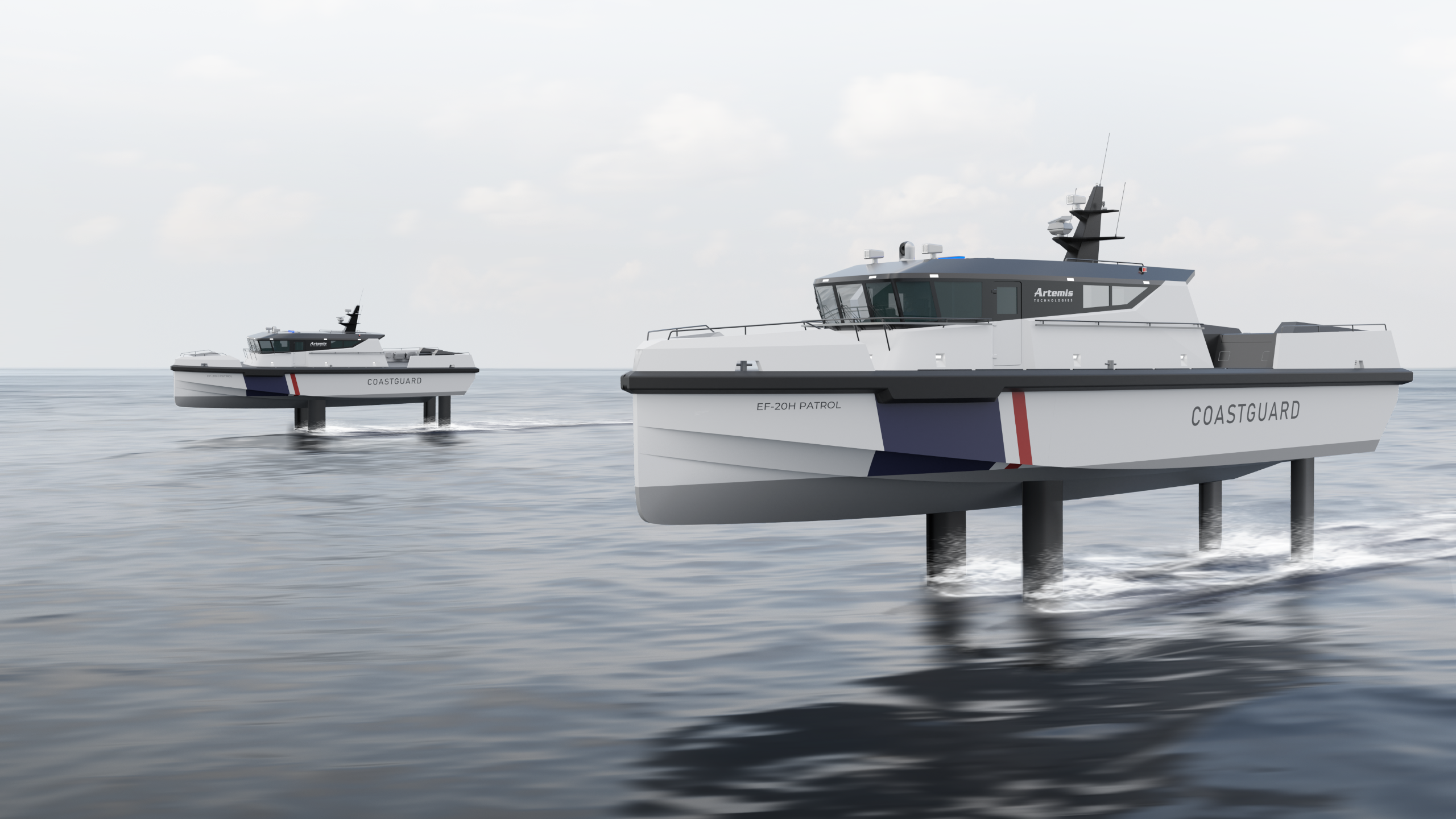 Two white foiling coastguard Artemis EF-20H Patrol boats. With one vessels bow closer and one vessel in the background of the image. The navy and red stripe are visible on the bow of the boat. The boat is hybrid electric.