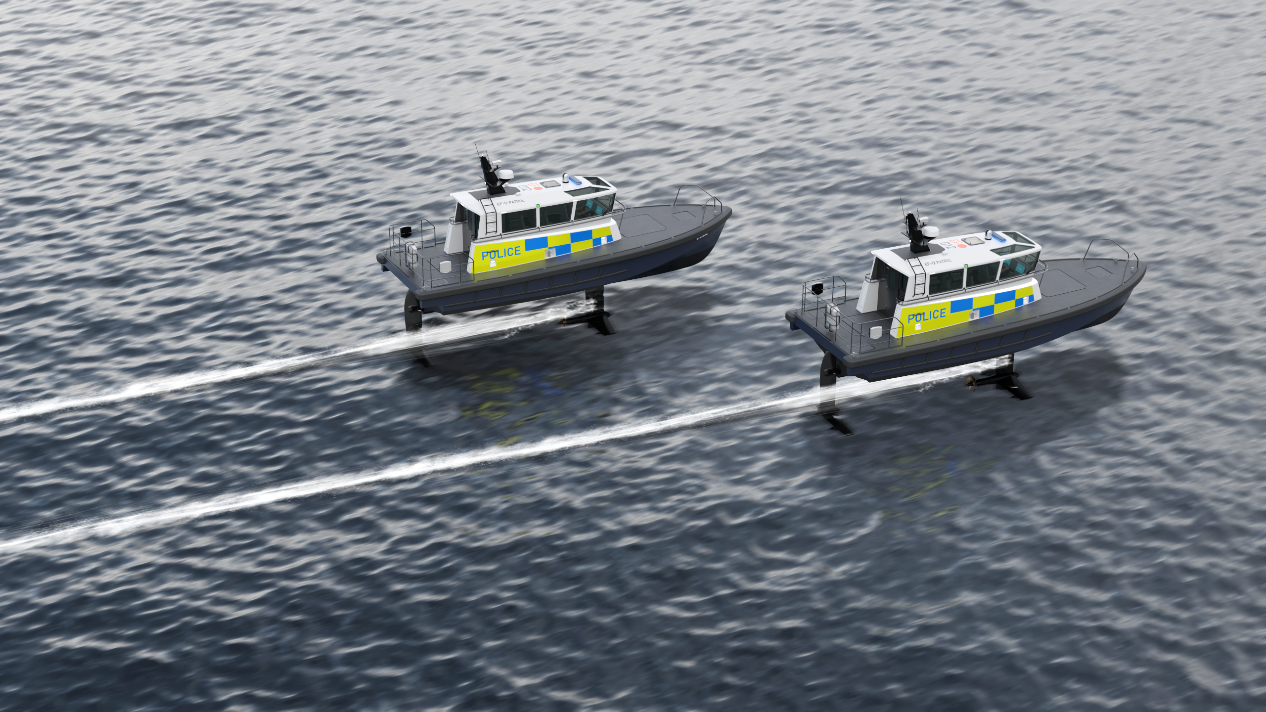 Two Artemis EF-12 Patrol boats foiling away showing the back top of the vessels and the minimal wake behind them