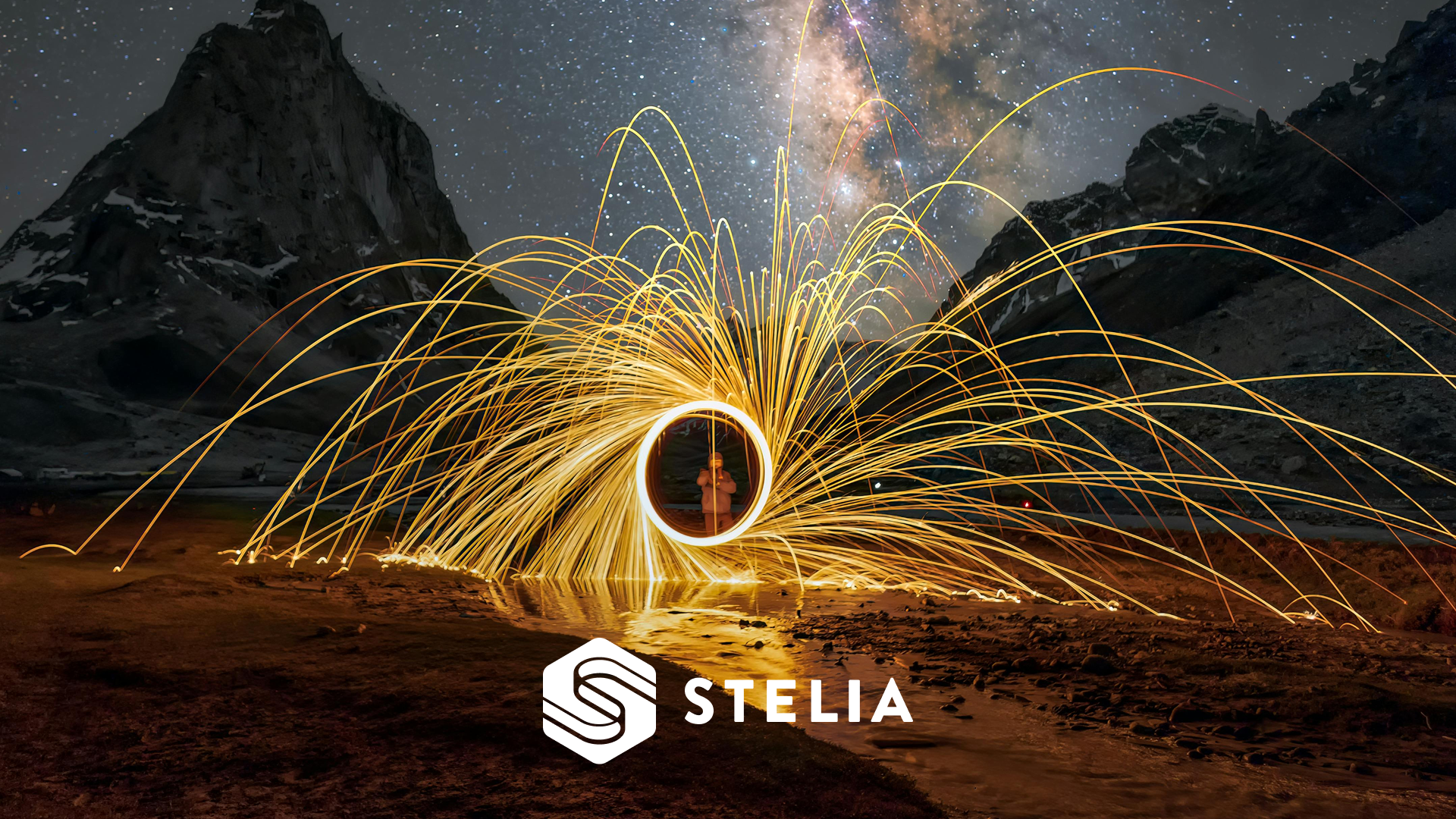 Energetic shot of a sparkler and night sky